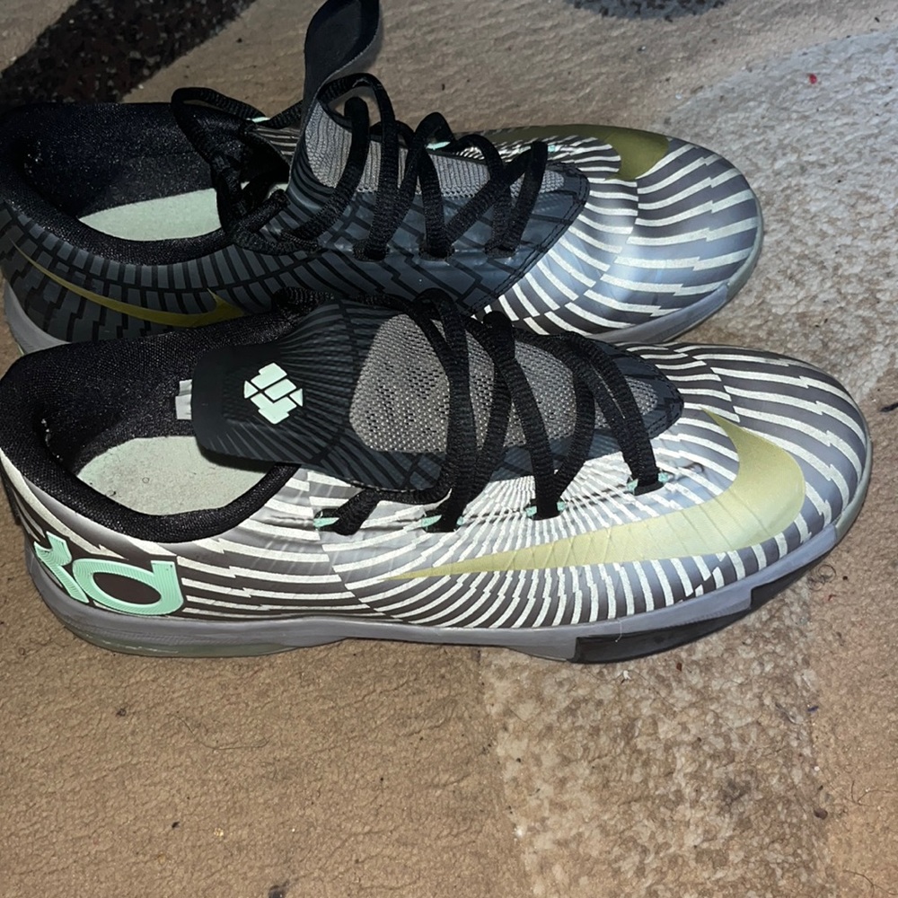 Grey green black & gold Nike